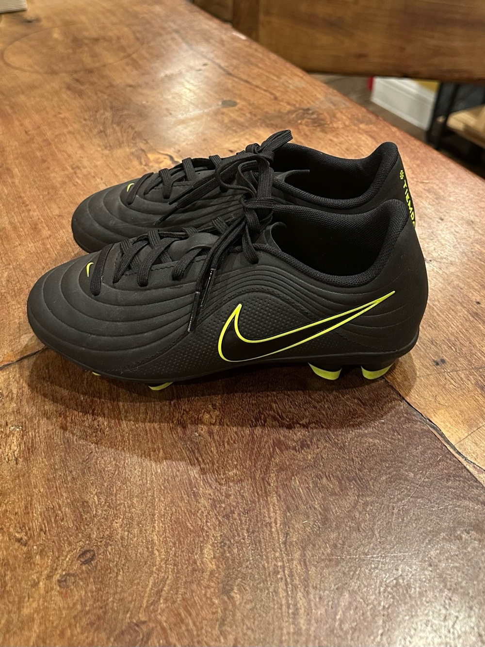 Kids Size 2.5 Nike Tiempo Black Soccer Cleats with Neon Yellow Swoosh
